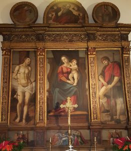 Girolamo Stabile, Polittico di San Rocco; al centro: Madonna con Bambino tra i Santi Sebastiano e Rocco; nella predella: Sant’Erasmo, Compianto su Cristo Morto, San Probo; nella cimasa: Annunciazione, olio su tavola, XVI sec., Formia, Chiesa di San Rocco (oggi rubato)