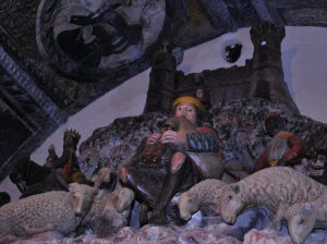Altobello Persio, Presepe in pietra policroma, Matera, Cattedrale, part. del suonatore di zampogna